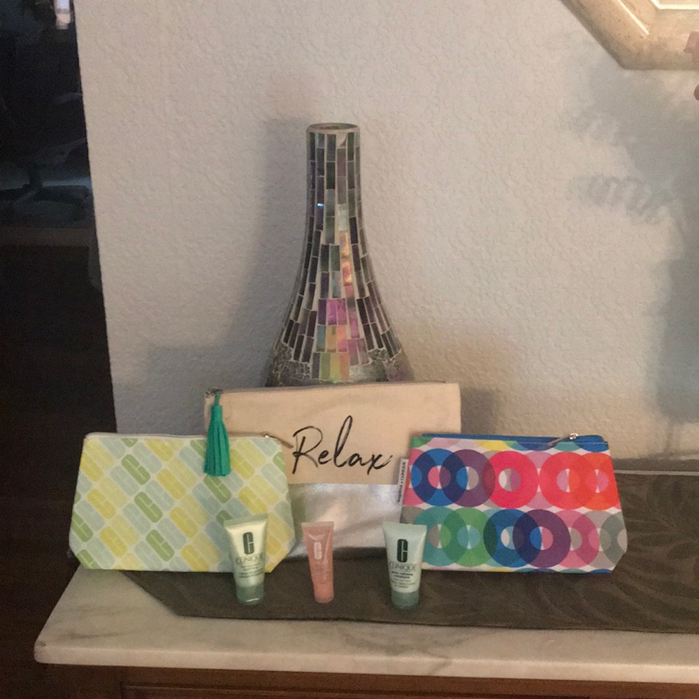 Three Makeup bags with some Clinique samples!!!
